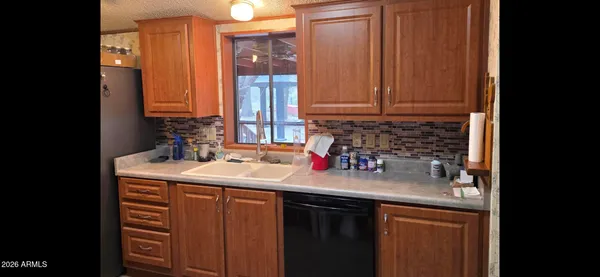 a room with fireplace and window