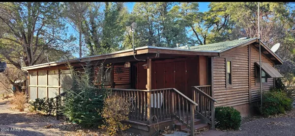 a view of front of house with a yard