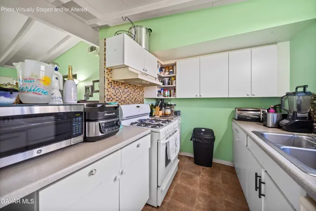 a bed room with a bed and a window