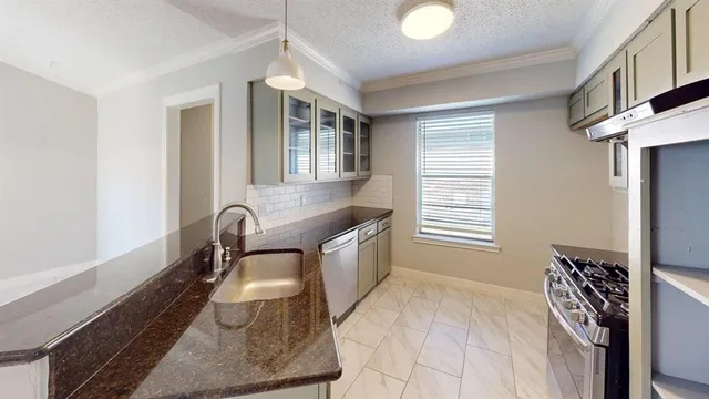 a spacious bathroom with a sink a vanity and a mirror