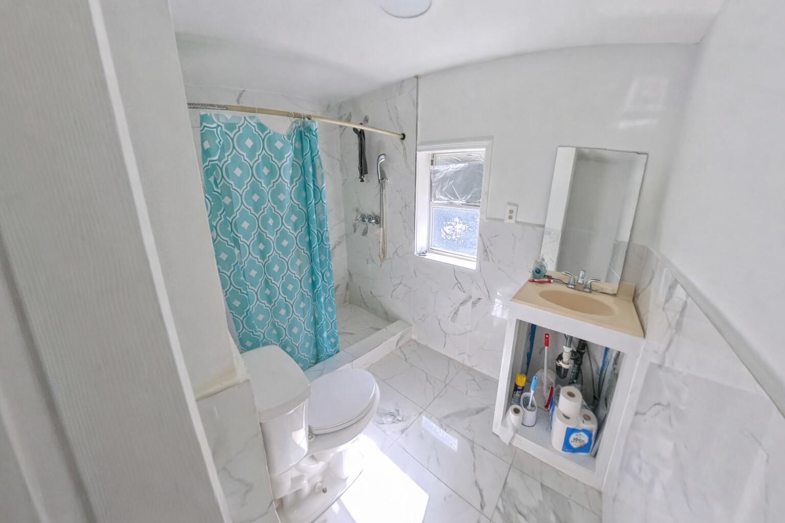 78 April Court Freeport, FL 32439 - Photo 20 of 39 a living room with furniture and a window