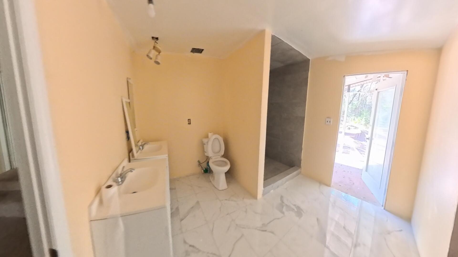 78 April Court Freeport, FL 32439 - Photo 21 of 39 a bathroom with a sink and toilet