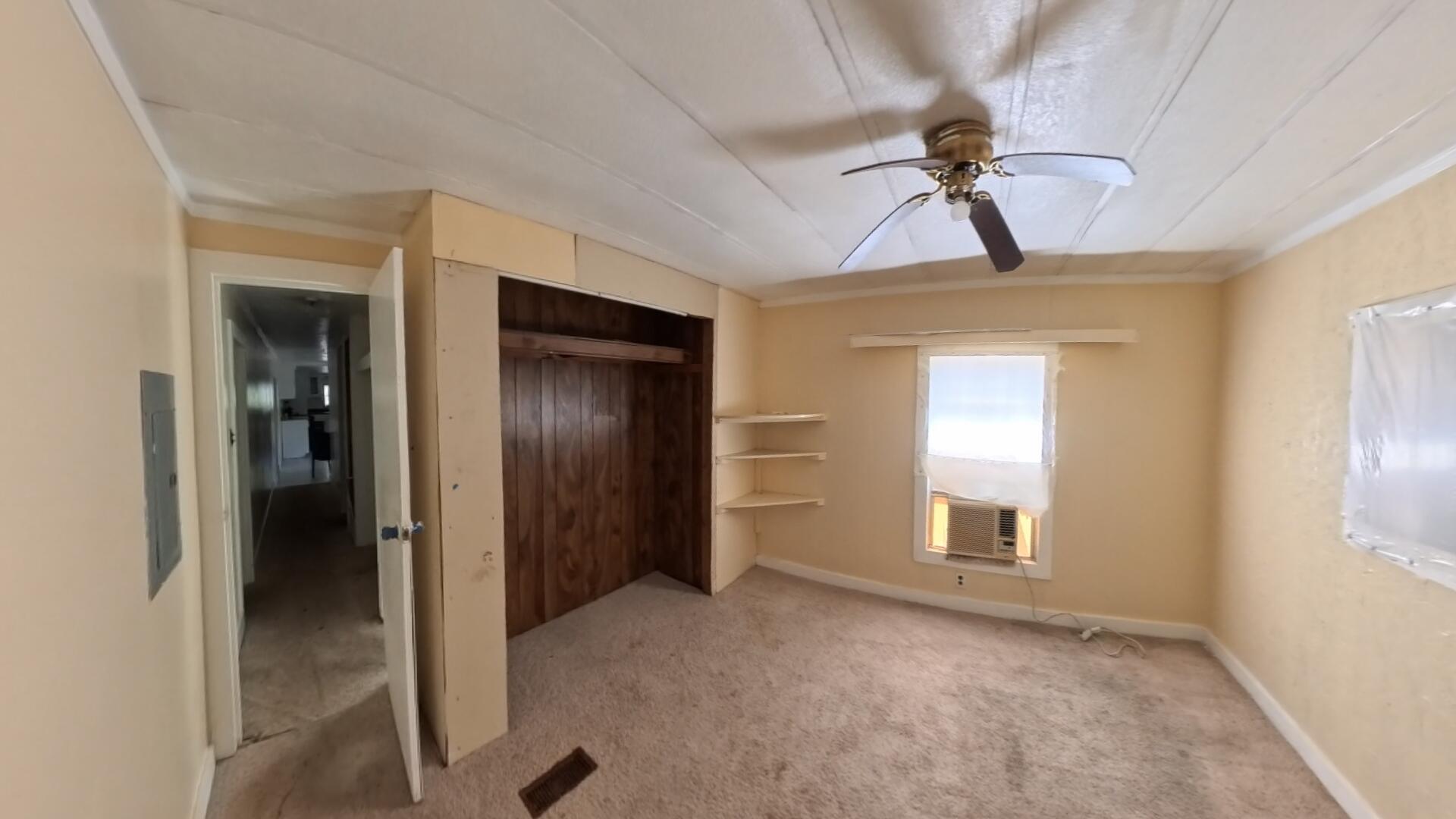 78 April Court Freeport, FL 32439 - Photo 22 of 39 a view of empty room with window and ceiling fan
