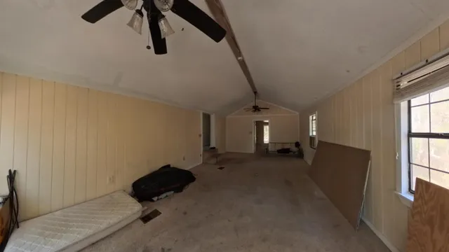 a kitchen with a refrigerator and a sink