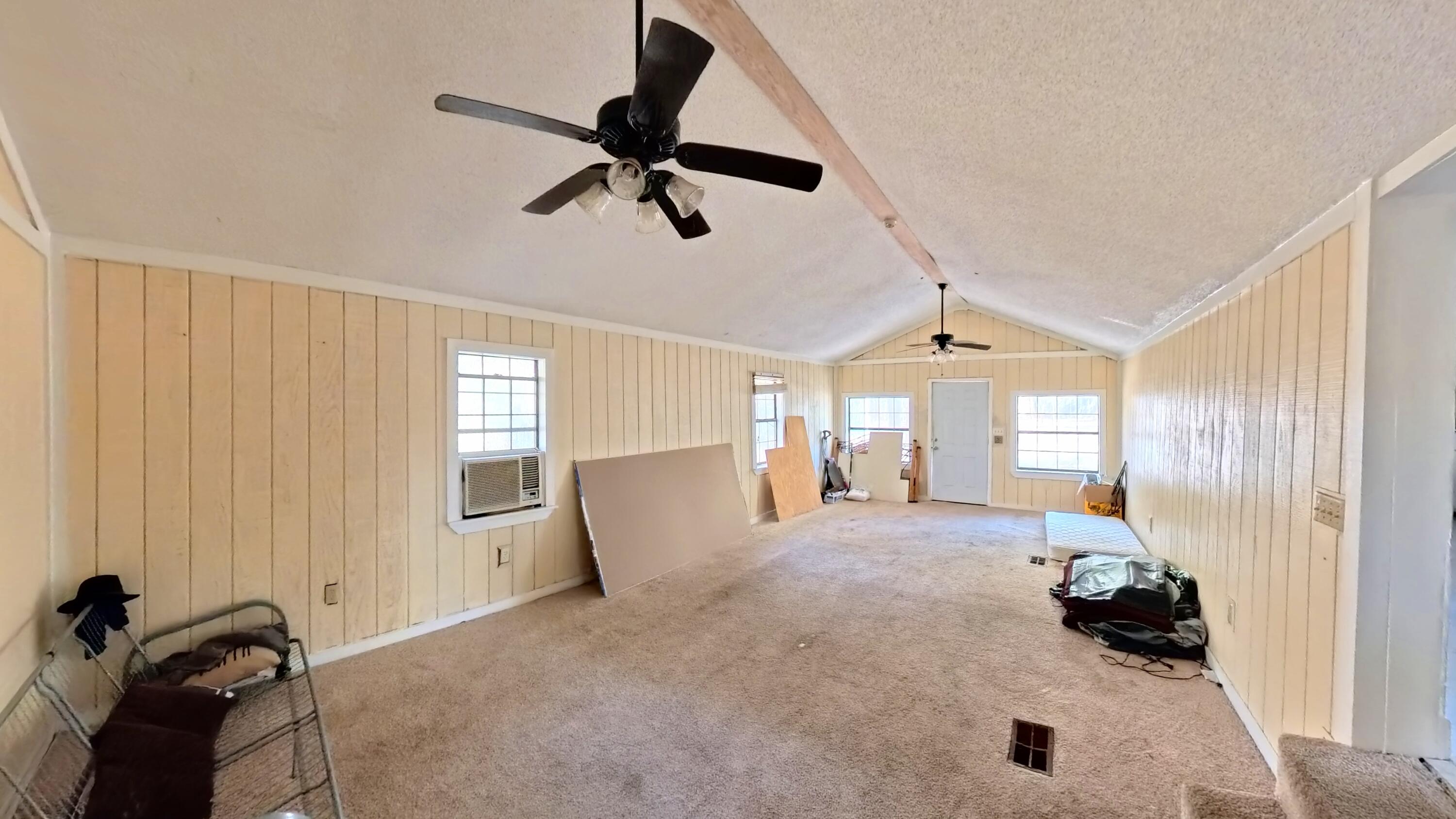 78 April Court Freeport, FL 32439 - Photo 27 of 39 a big room with windows and closet
