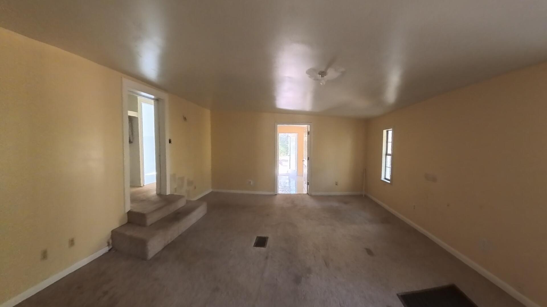 78 April Court Freeport, FL 32439 - Photo 32 of 39 an empty room with windows