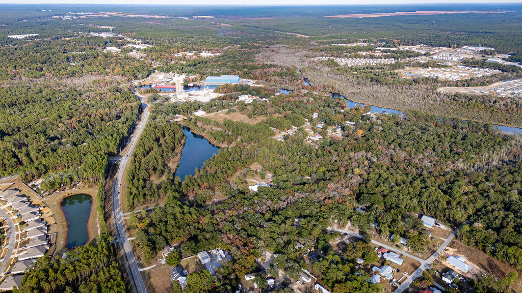 78 April Court Freeport, FL 32439 - Photo 9 of 18 an aerial view of residential houses with outdoor space