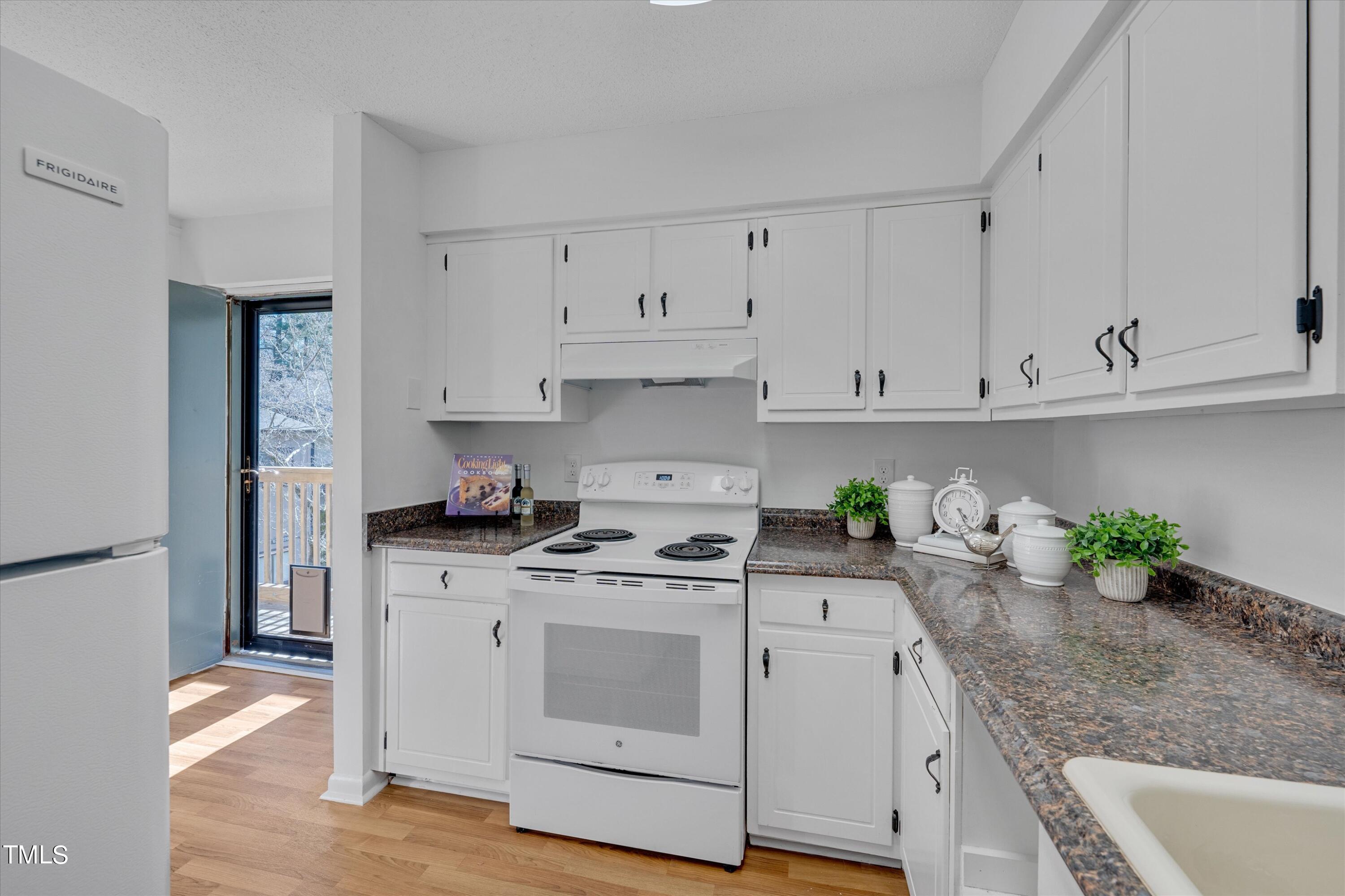 617 Pine Ridge Place Raleigh, NC 27609 - Photo 3 of 18 Updated kitchen