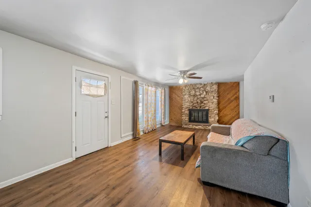 a kitchen with a stove sink and refrigerator