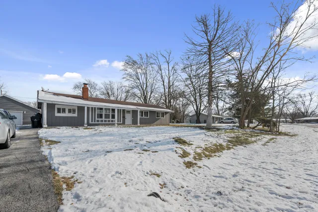 a view of a yard in front of a house