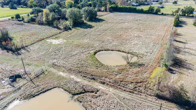 a view of a backyard of a house