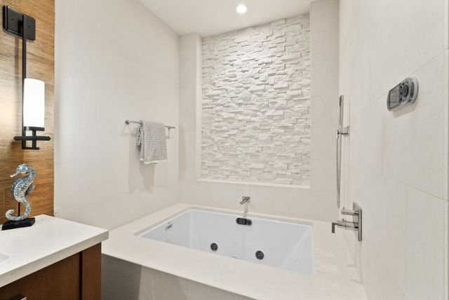 a view of house with swimming pool yard and outdoor seating