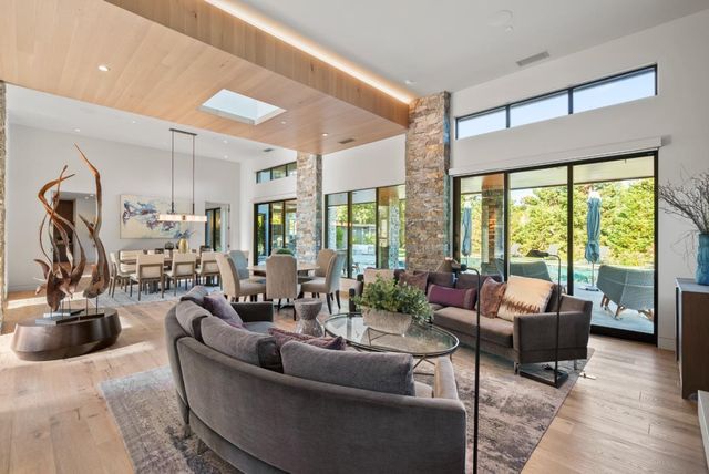 a bathroom with a sink toilet and mirror