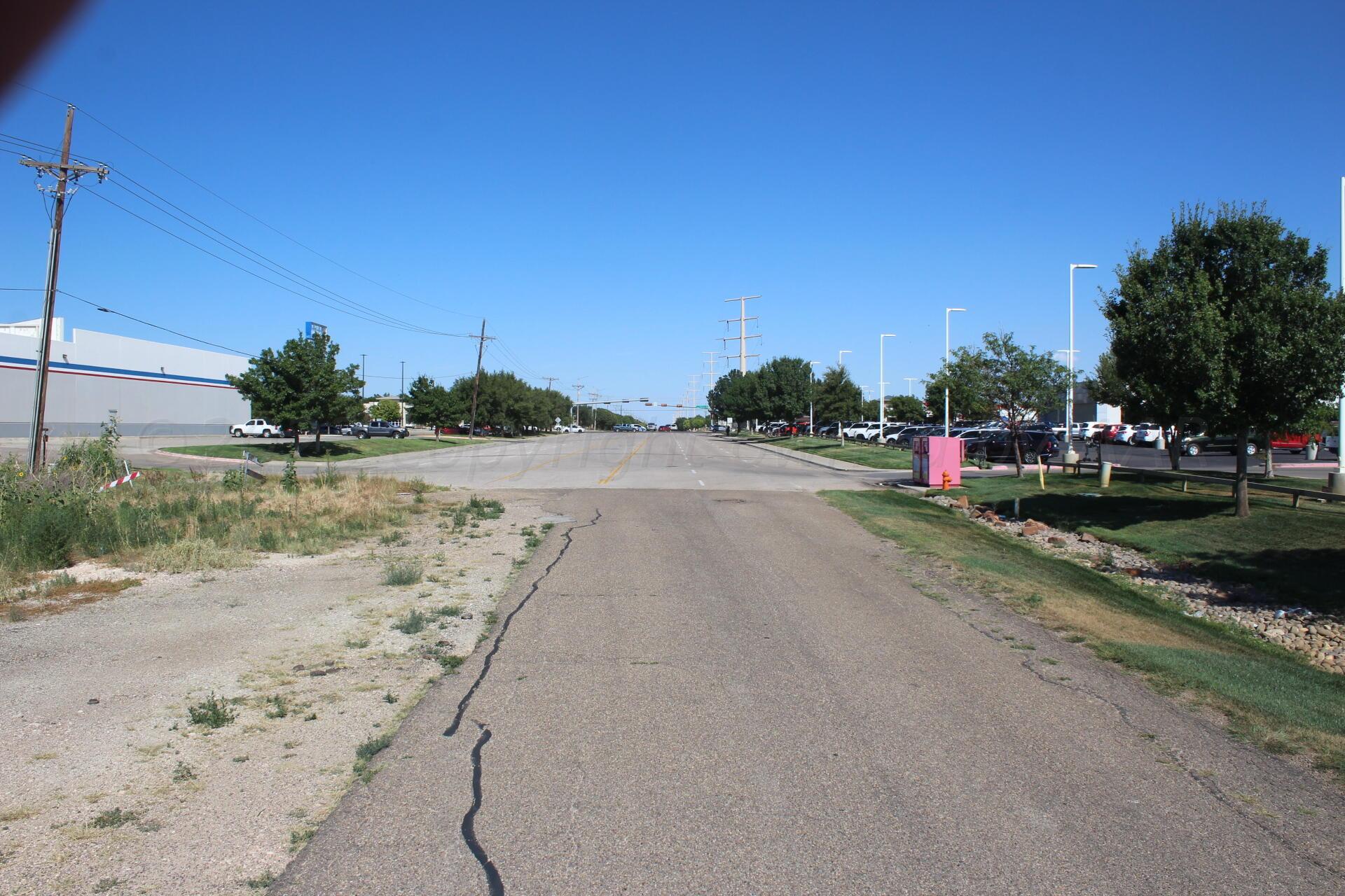 0 Southwest 45th Avenue Amarillo, TX 79119 - Photo 2 of 9 a view of a road with a yard
