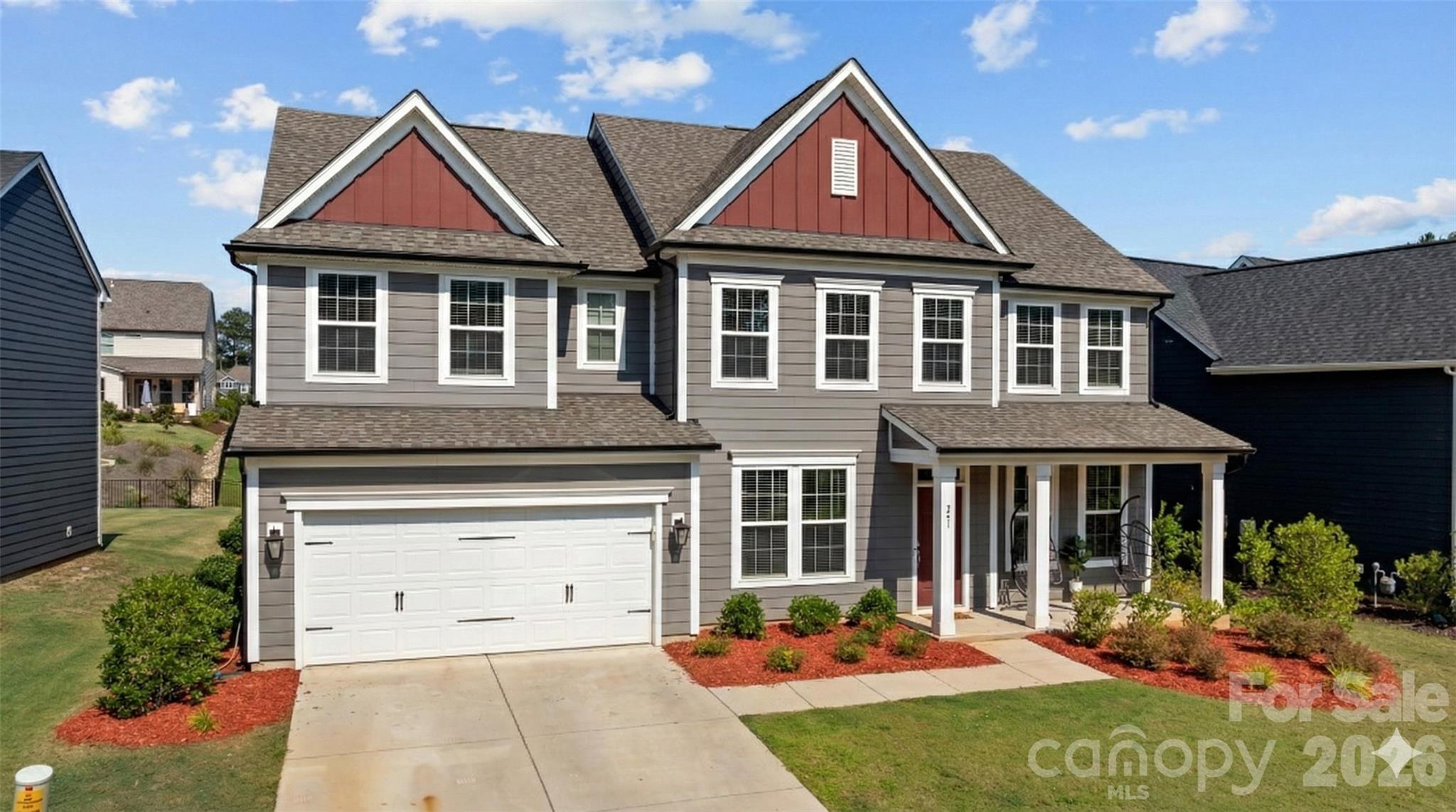 241 Boxelder Road Clover, SC 29710 - Photo 1 of 35 a front view of a house with garden