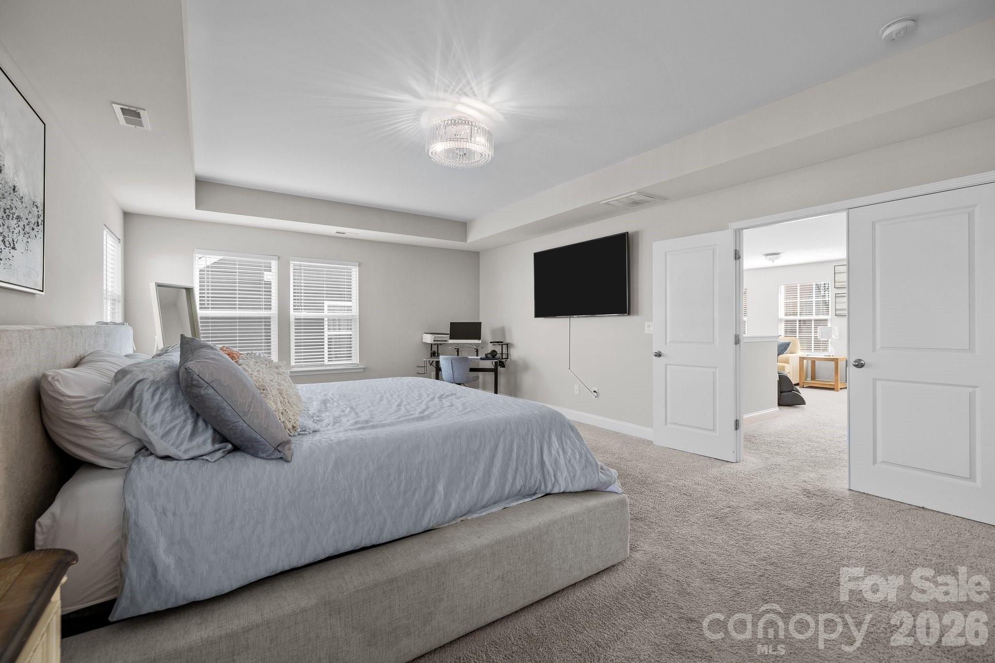 241 Boxelder Road Clover, SC 29710 - Photo 18 of 35 a bedroom with a bed and glass door