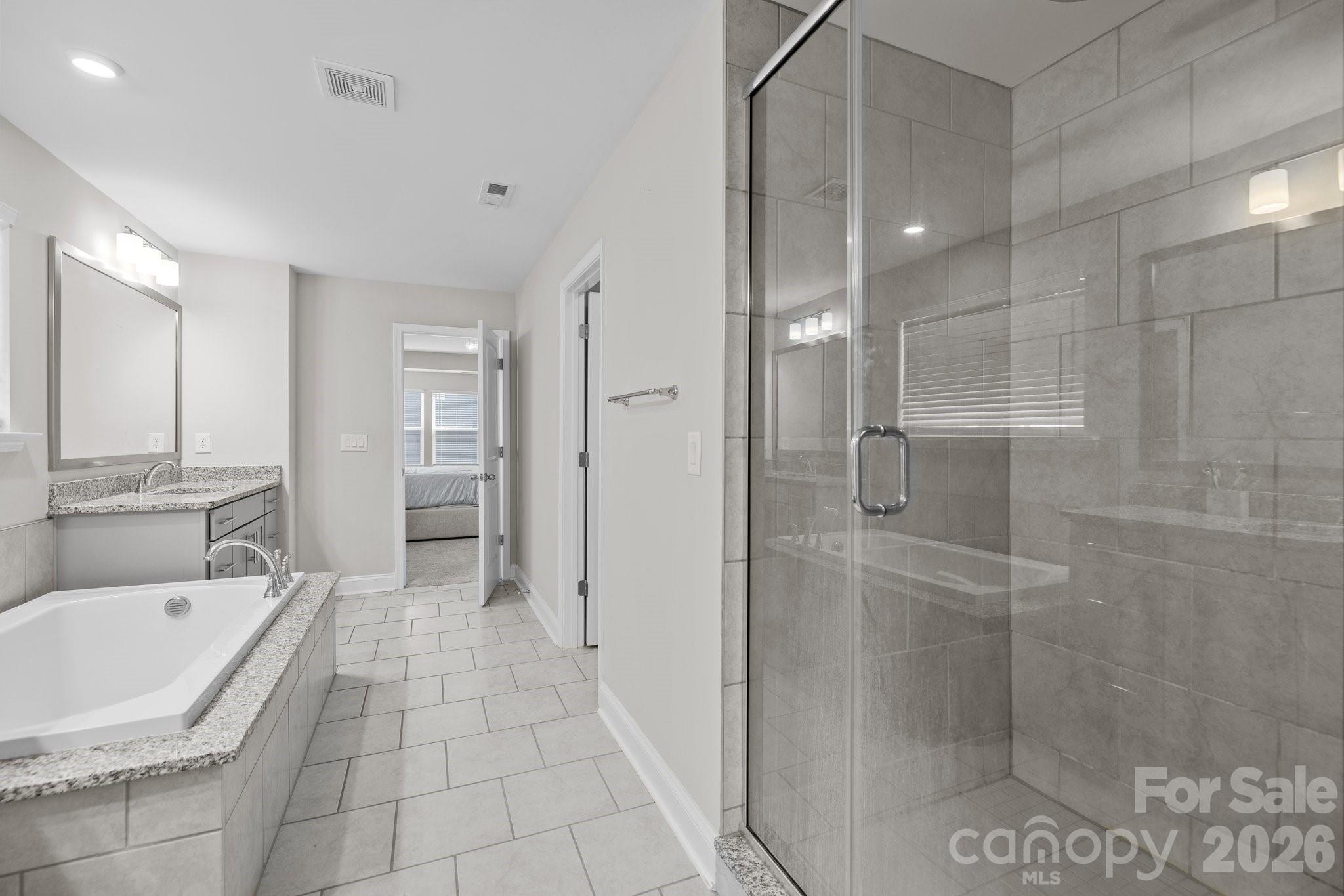 241 Boxelder Road Clover, SC 29710 - Photo 20 of 35 a bathroom with a bathtub and a shower