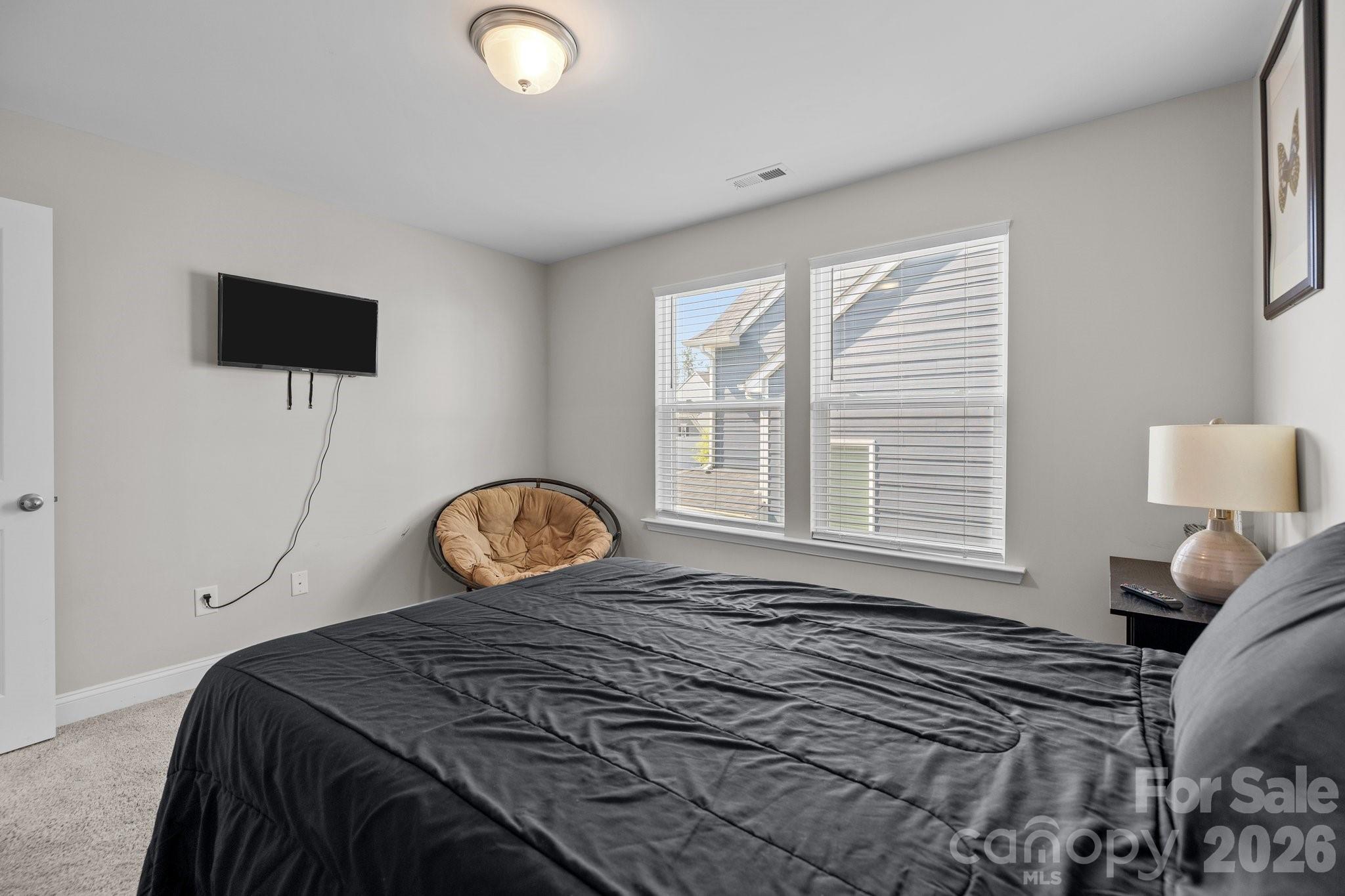 241 Boxelder Road Clover, SC 29710 - Photo 28 of 35 a bedroom with a bed and a window