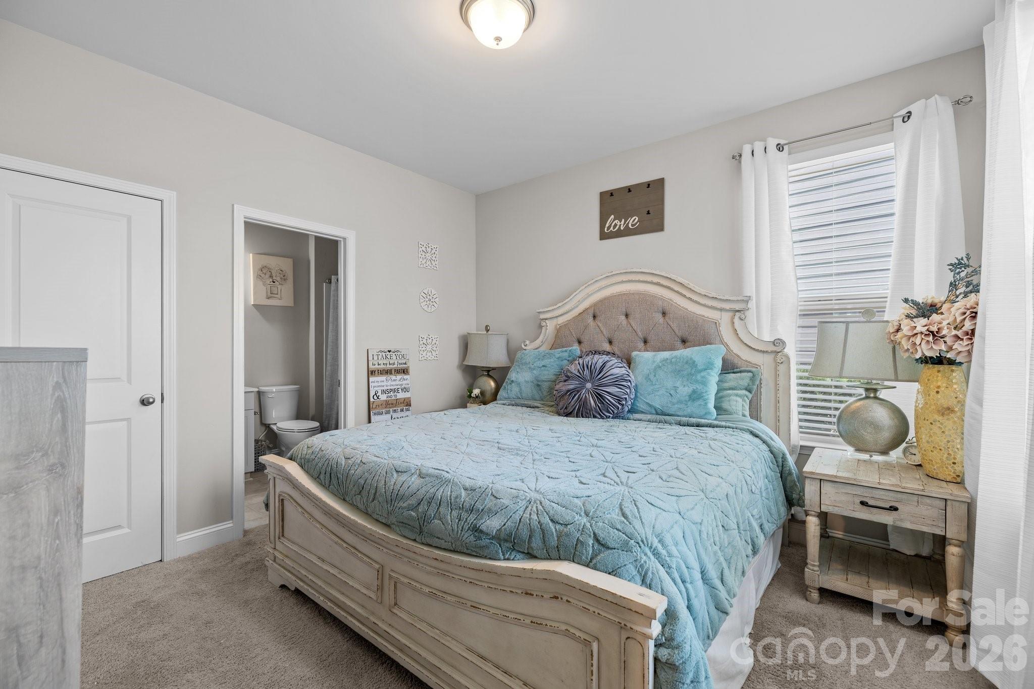 241 Boxelder Road Clover, SC 29710 - Photo 31 of 35 a bedroom with a bed and wooden floor