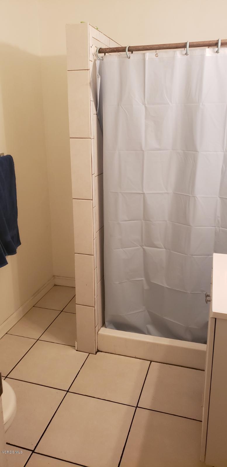 252 Smith Street Oxnard, CA 93033 - Photo 19 of 19 a bathroom with a shower