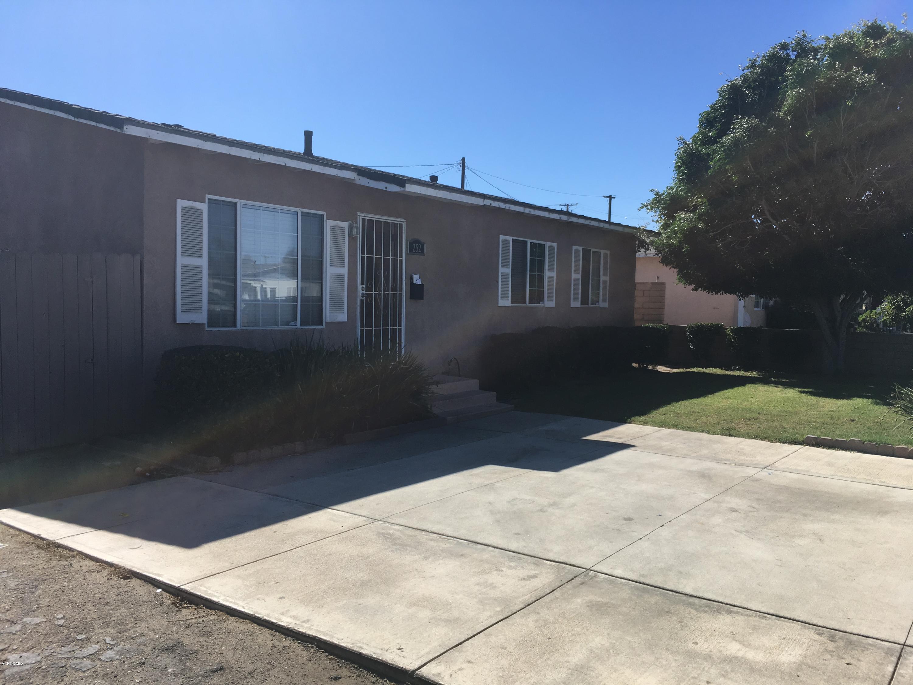 252 Smith Street Oxnard, CA 93033 - Photo 2 of 19 a backyard of a house