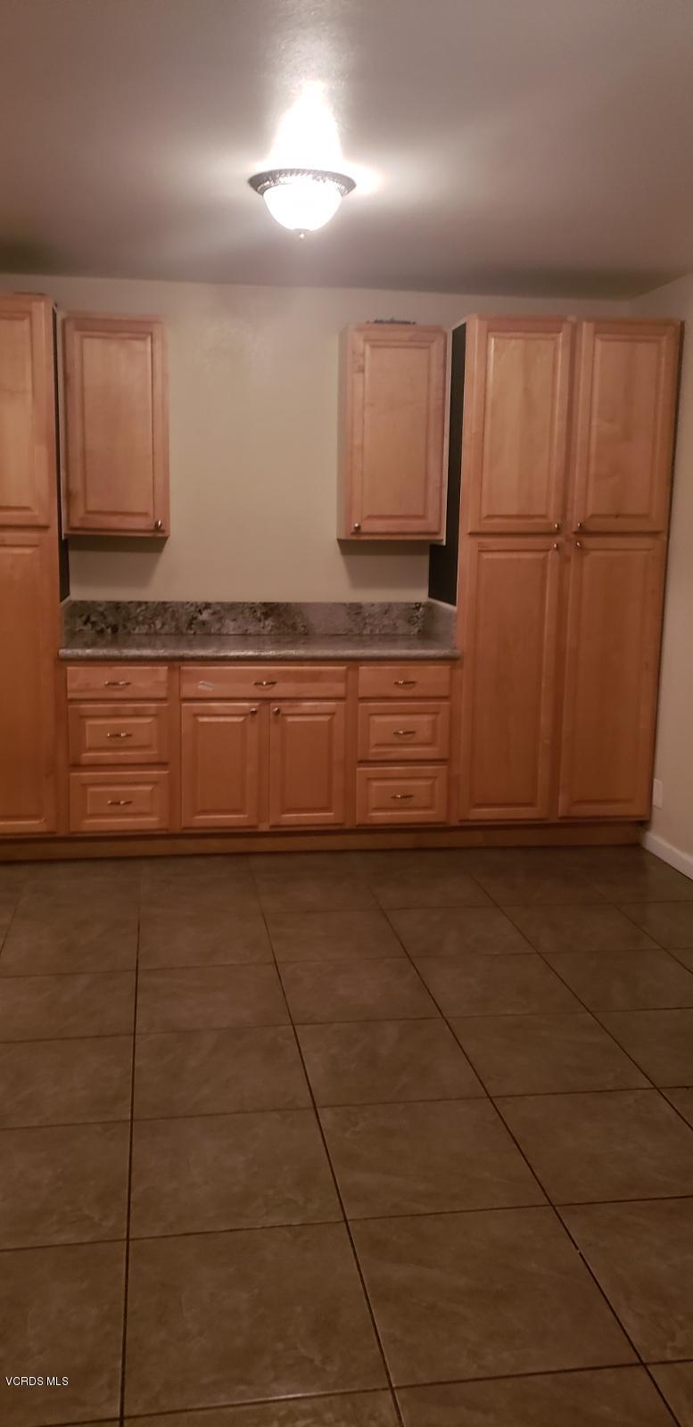 252 Smith Street Oxnard, CA 93033 - Photo 8 of 19 a view of a kitchen with an oven