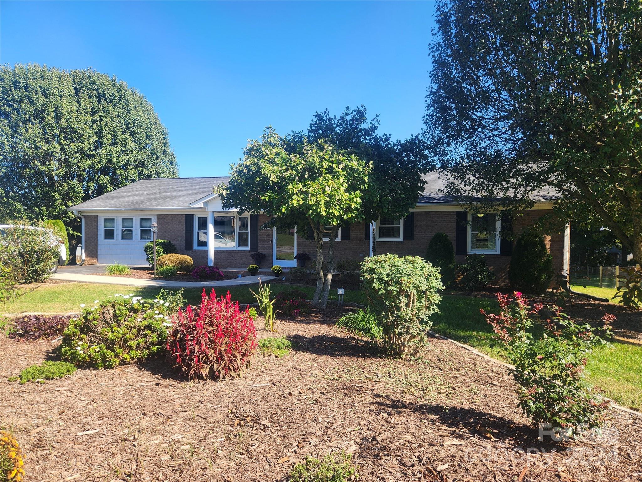 338 Helmstetler Road Lexington, NC 27295 - Photo 1 of 38 front view of a house with a yard