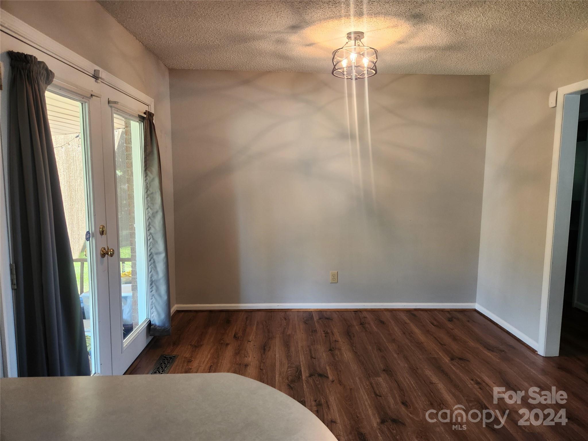 338 Helmstetler Road Lexington, NC 27295 - Photo 20 of 38 a view of a hallway with wooden floor