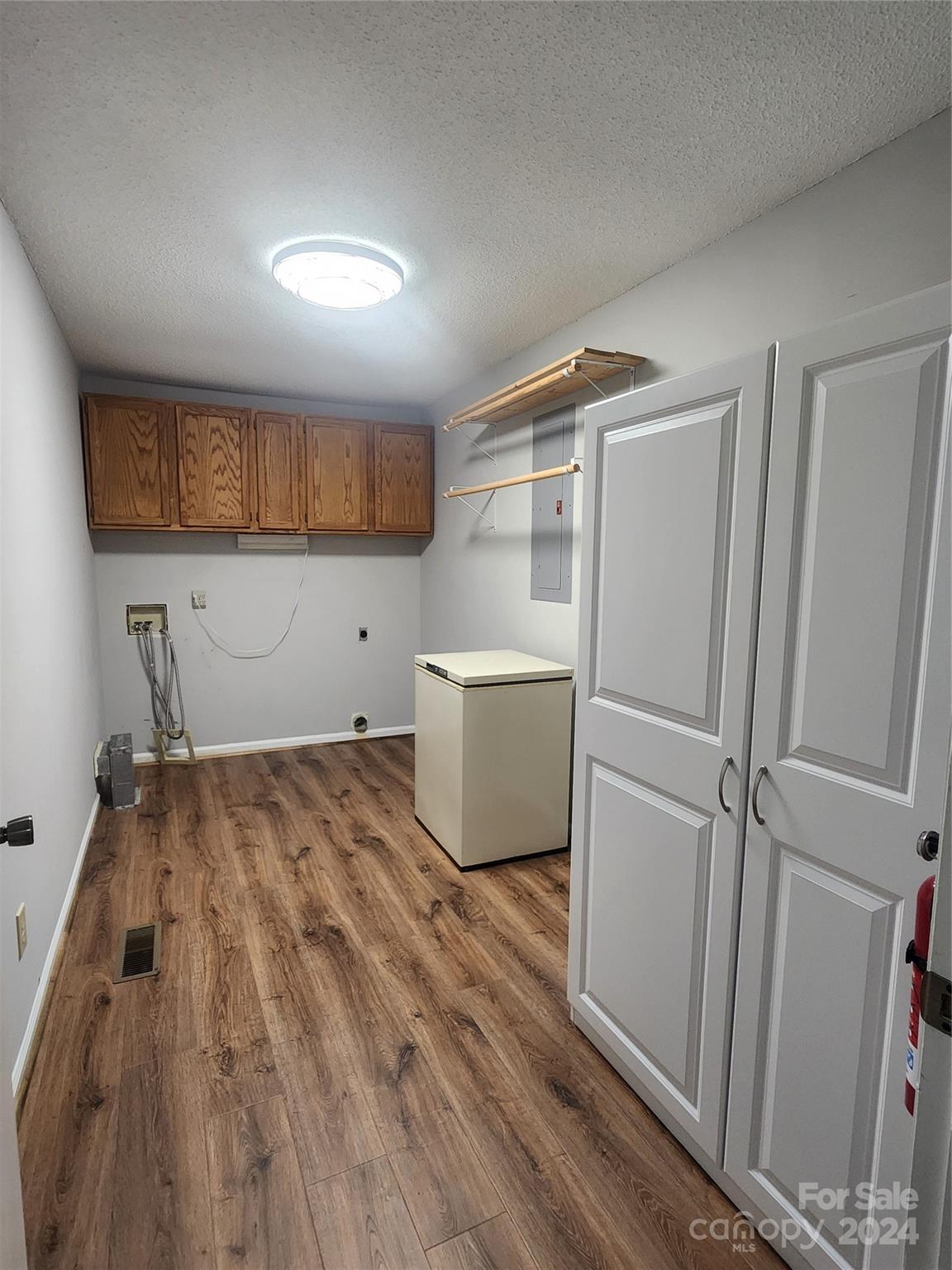 338 Helmstetler Road Lexington, NC 27295 - Photo 7 of 38 a kitchen with a refrigerator and a sink