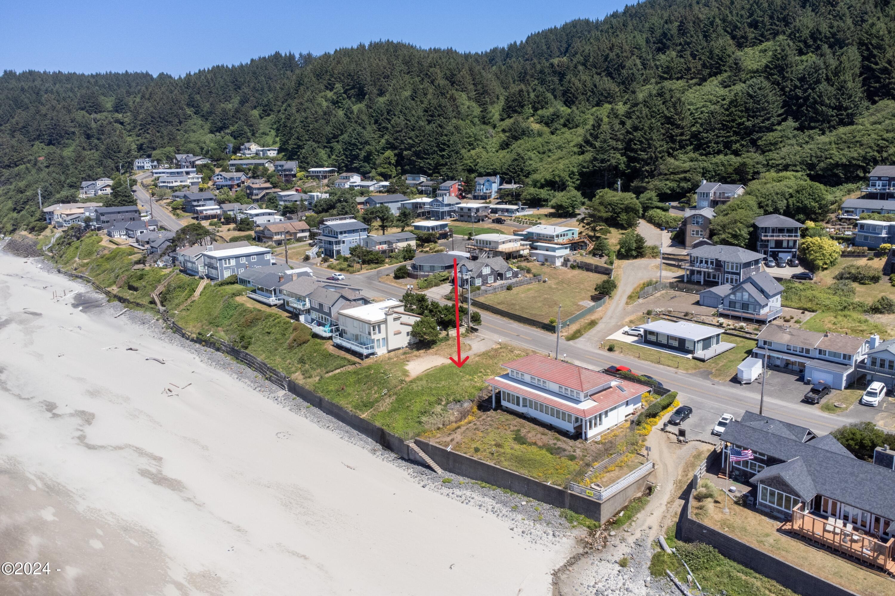 7307 Northwest Logan Road Lincoln City, OR 97367 - Photo 9 of 11 7307 NW Logan Rd (drone)-8 - arrow
