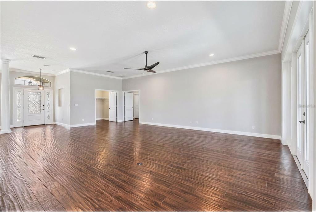 2350 Virgil Hall Road Lithia, FL 33547 - Photo 36 of 52 wooden floor in an empty room with a window