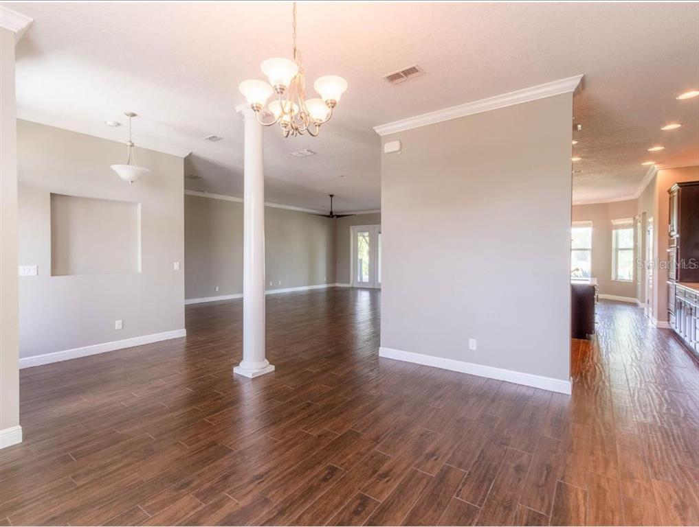 2350 Virgil Hall Road Lithia, FL 33547 - Photo 37 of 52 a view of a livingroom with wooden floor