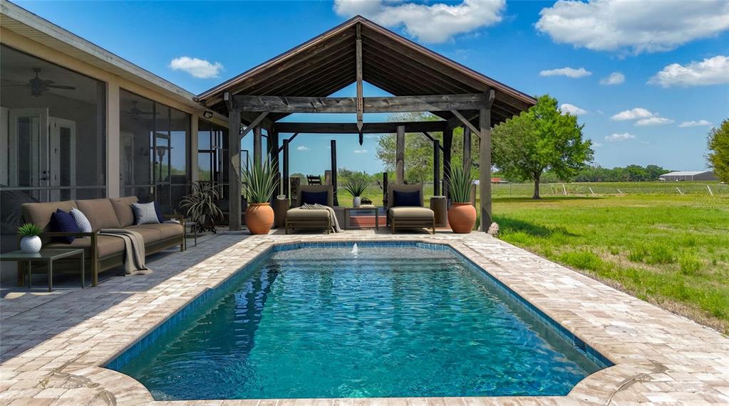 2350 Virgil Hall Road Lithia, FL 33547 - Photo 4 of 52 a view of a swimming pool with a patio