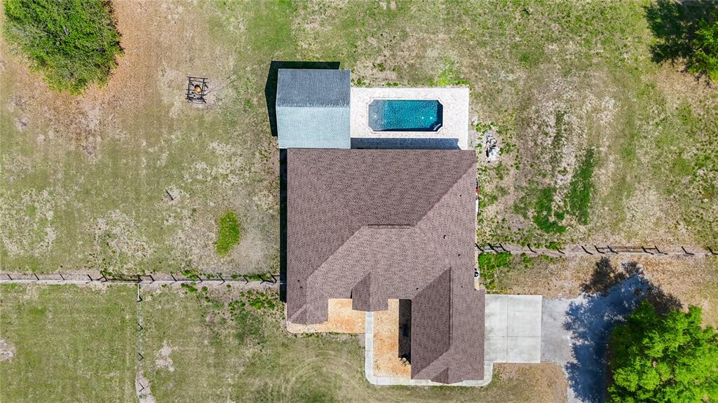2350 Virgil Hall Road Lithia, FL 33547 - Photo 48 of 52 aerial view of a house with a yard