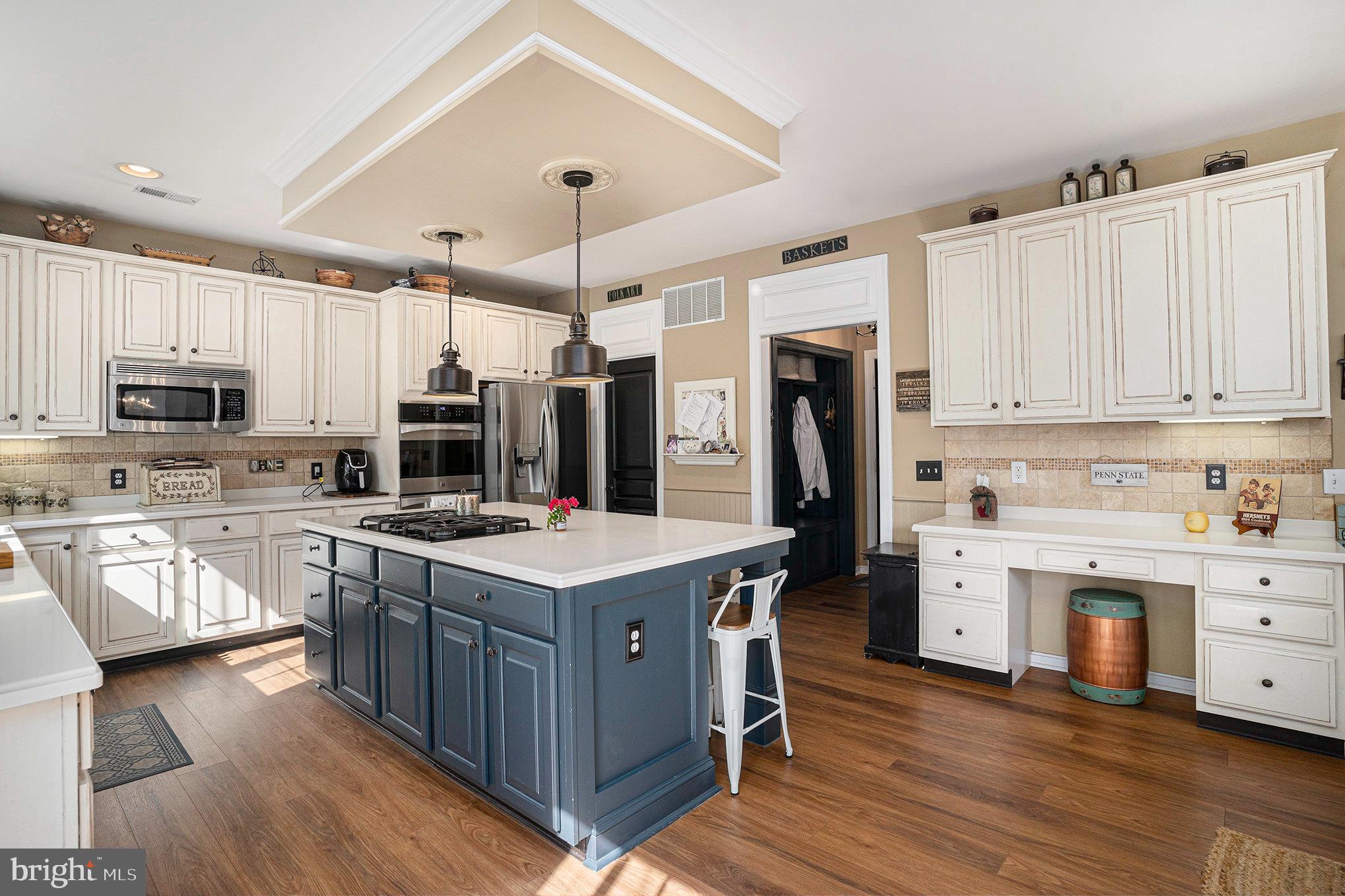 1250 Appalachian Road Ambler, PA 19002 - Photo 12 of 58 a kitchen with stainless steel appliances a stove refrigerator sink and microwave