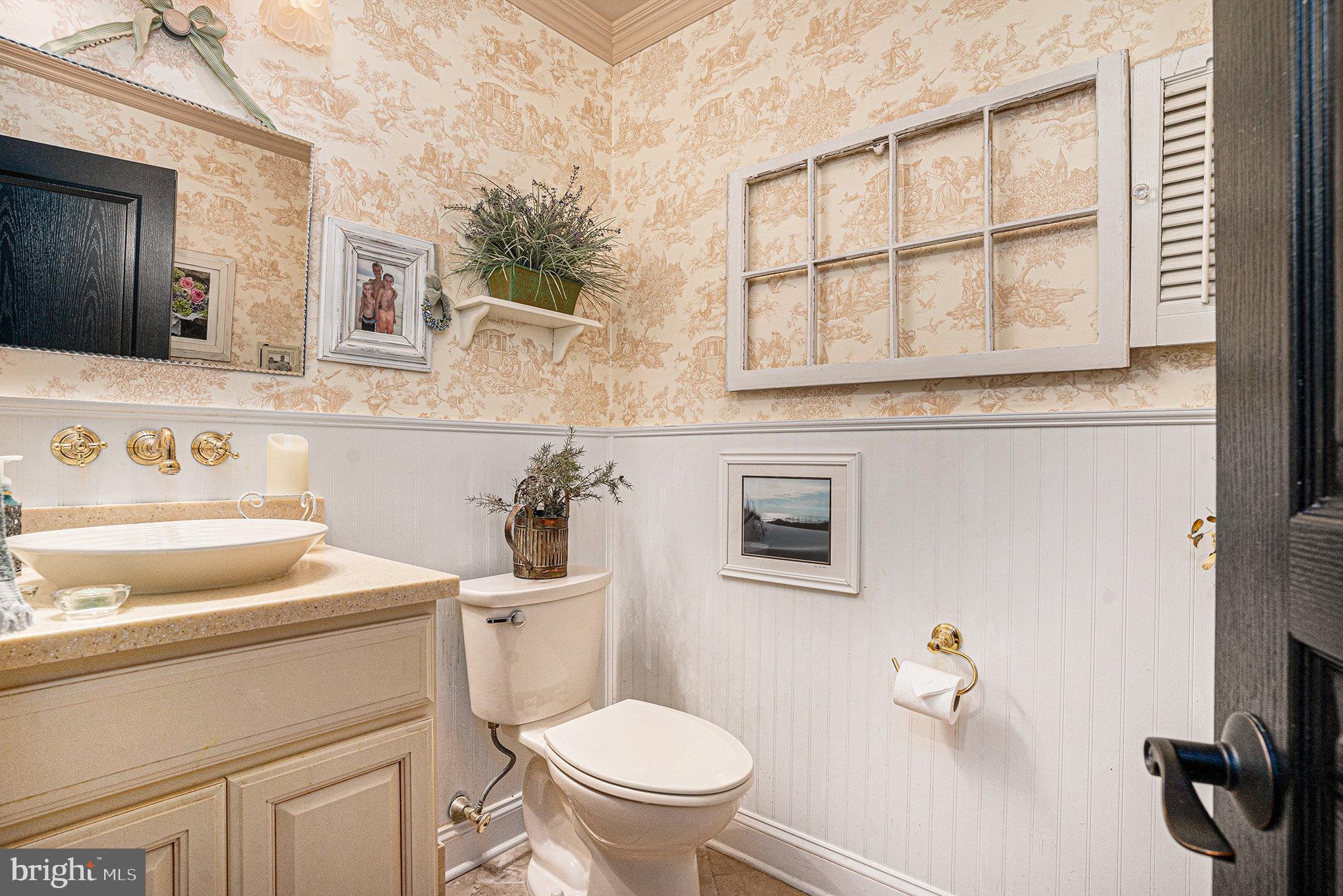 1250 Appalachian Road Ambler, PA 19002 - Photo 23 of 58 a bathroom with a sink a toilet and a mirror