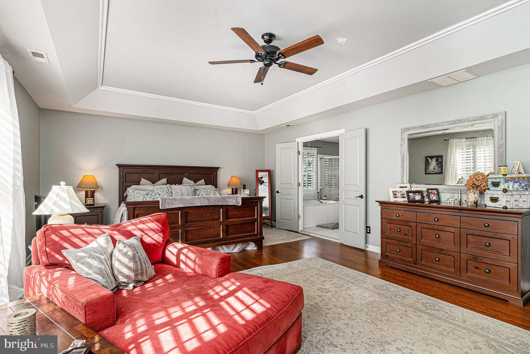 1250 Appalachian Road Ambler, PA 19002 - Photo 35 of 58 a bedroom with a bed and wooden floor