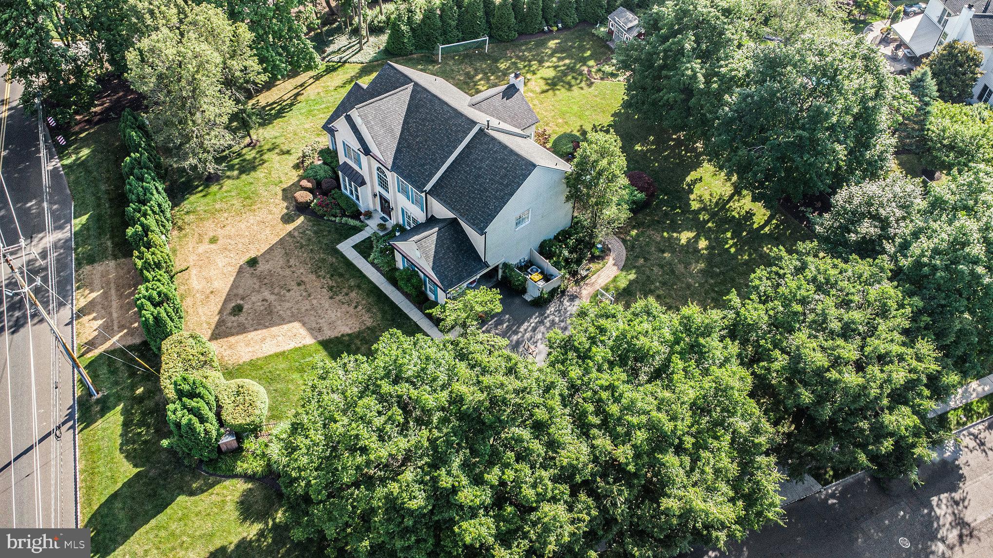 1250 Appalachian Road Ambler, PA 19002 - Photo 50 of 58 an aerial view of a house with swimming pool and garden