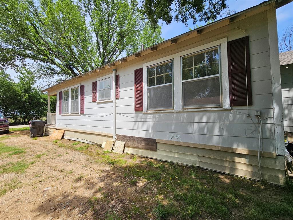 127 East Morgan Street Pilot Point, TX 76258 - Photo 6 of 25 View of property exterior