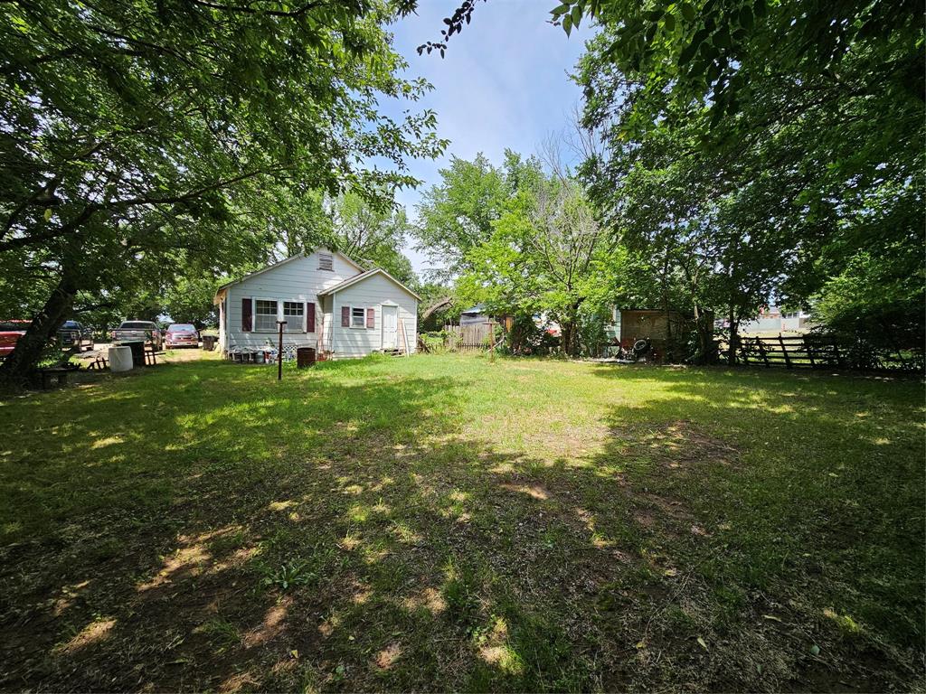 127 East Morgan Street Pilot Point, TX 76258 - Photo 7 of 25 View of yard