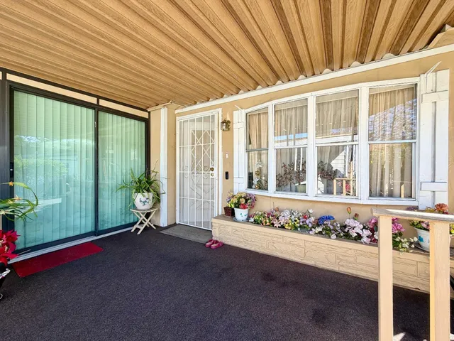 a front view of a house with outdoor space
