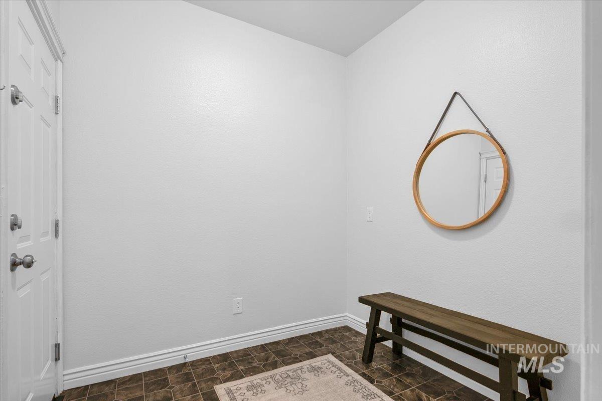 1075 North Purple Sage Way Eagle, ID 83616 - Photo 18 of 44 Interior space featuring baseboards
