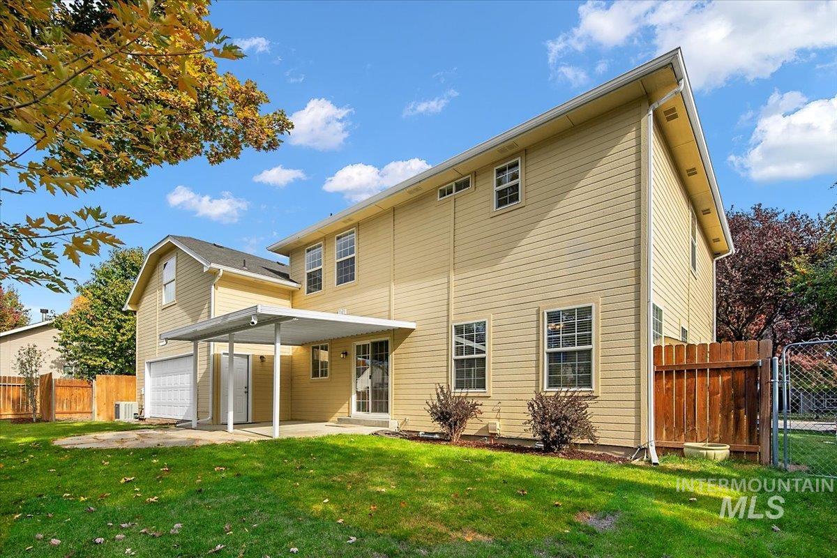 1075 North Purple Sage Way Eagle, ID 83616 - Photo 36 of 44 Back of house with a patio and a gate