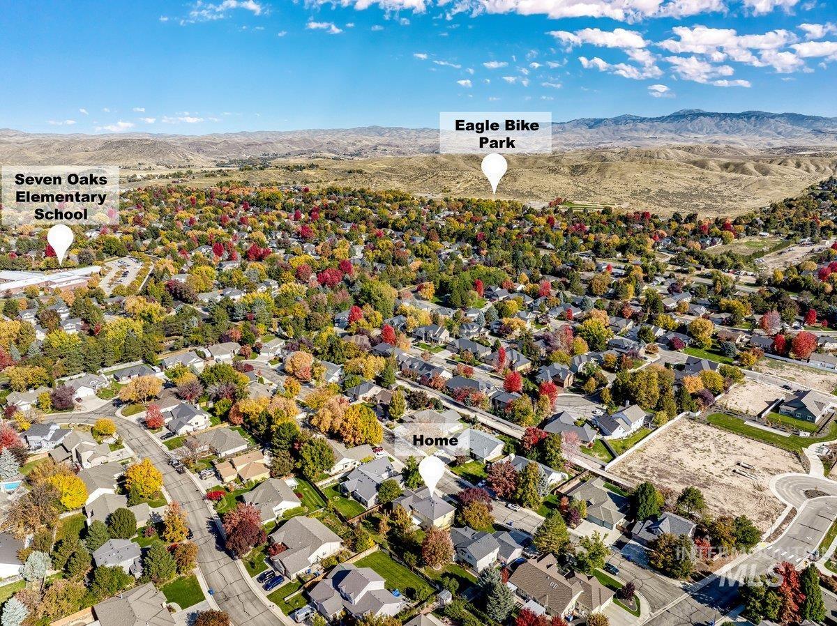1075 North Purple Sage Way Eagle, ID 83616 - Photo 43 of 44 Aerial view of residential area featuring mountains