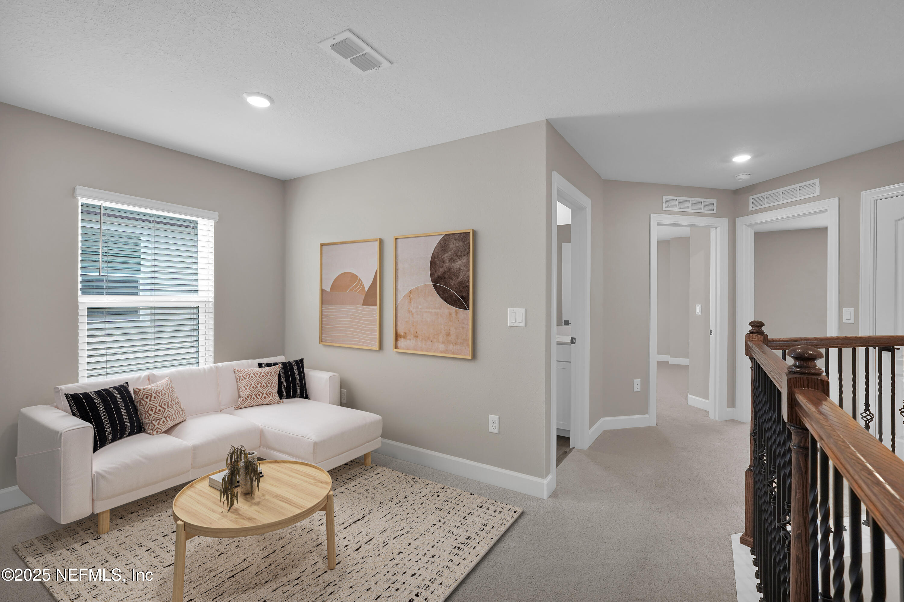 3987 Gareys Ferry Way Middleburg, FL 32068 - Photo 13 of 25 a living room with furniture and a window