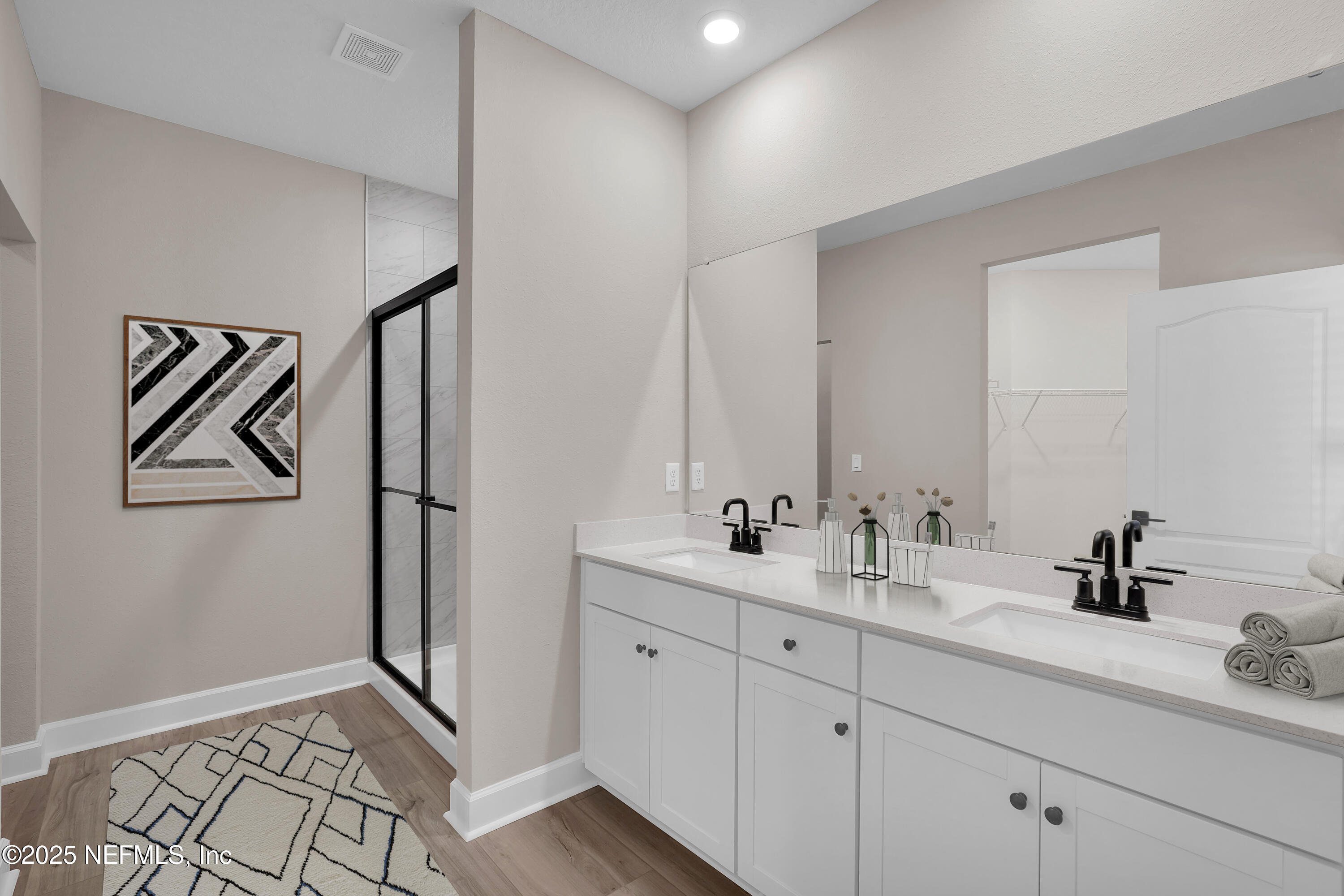 3987 Gareys Ferry Way Middleburg, FL 32068 - Photo 21 of 25 a bathroom with a sink and mirror