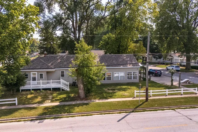 a view of a swimming pool with a patio