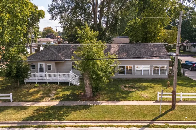 a aerial view of a house with a swimming pool