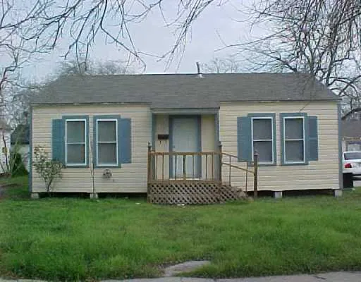 a view of a house with a garden