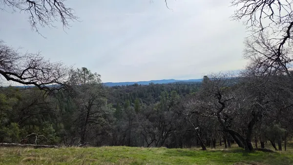 a view of an outdoor space with a lake view